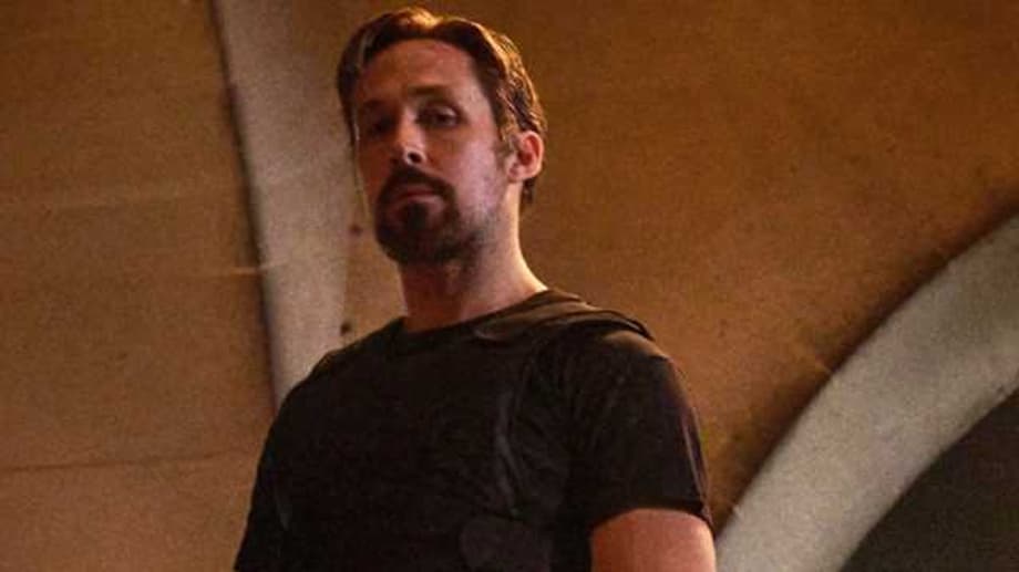 THE GRAY MAN Stars Ryan Gosling & Chris Evans Face Off On New Empire Cover; Plus New Still